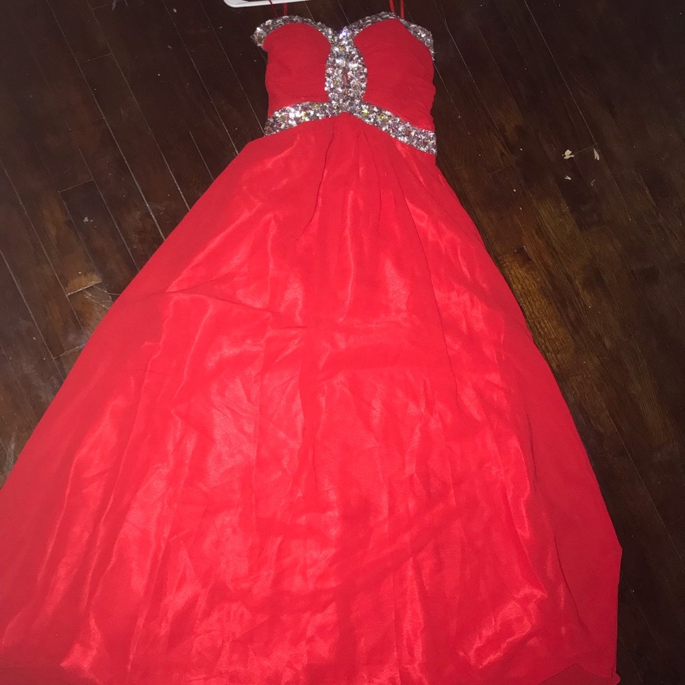 Long red prom dress.